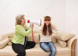 parent yelling into megaphone pointed at student