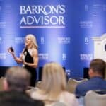 Cozy Wittman speaking at Barron's Teams Summit